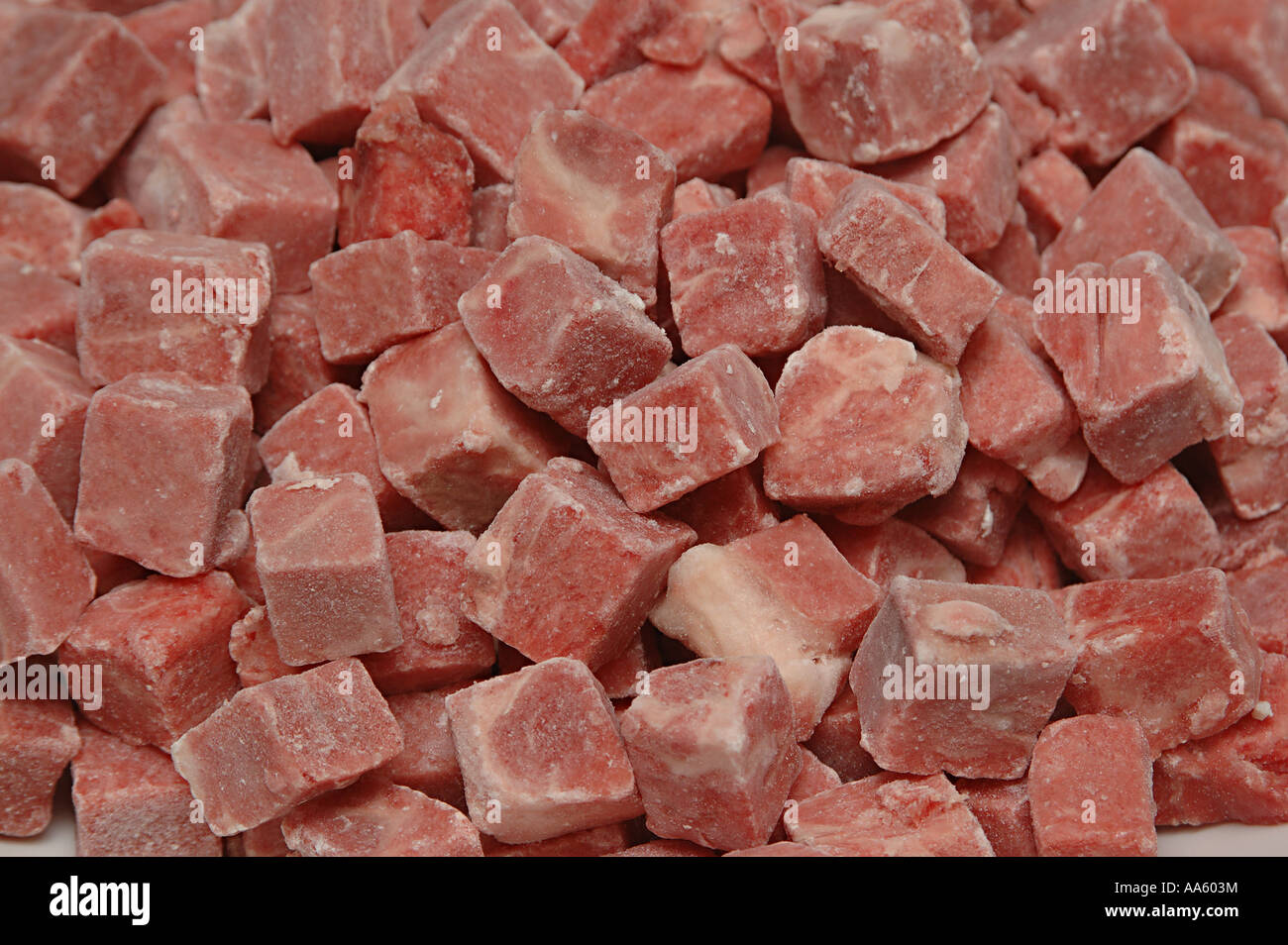 Raw chunks of frozen beef Stock Photo Alamy