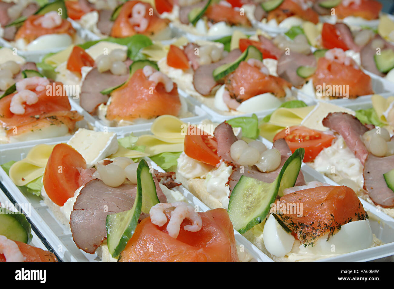 ANG103884 Landgang open sandwich with bread from right starting with cheese brei cheese potatoes salad roast beef Stock Photo