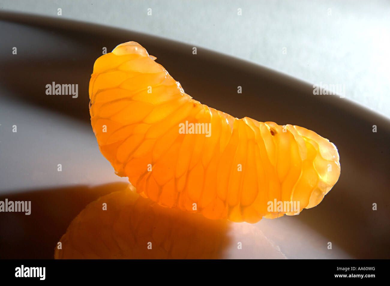 ANG103916 Fruit Orange Citrus reticulata Clementin Rutaceae one piece skin peeled orange Stock Photo
