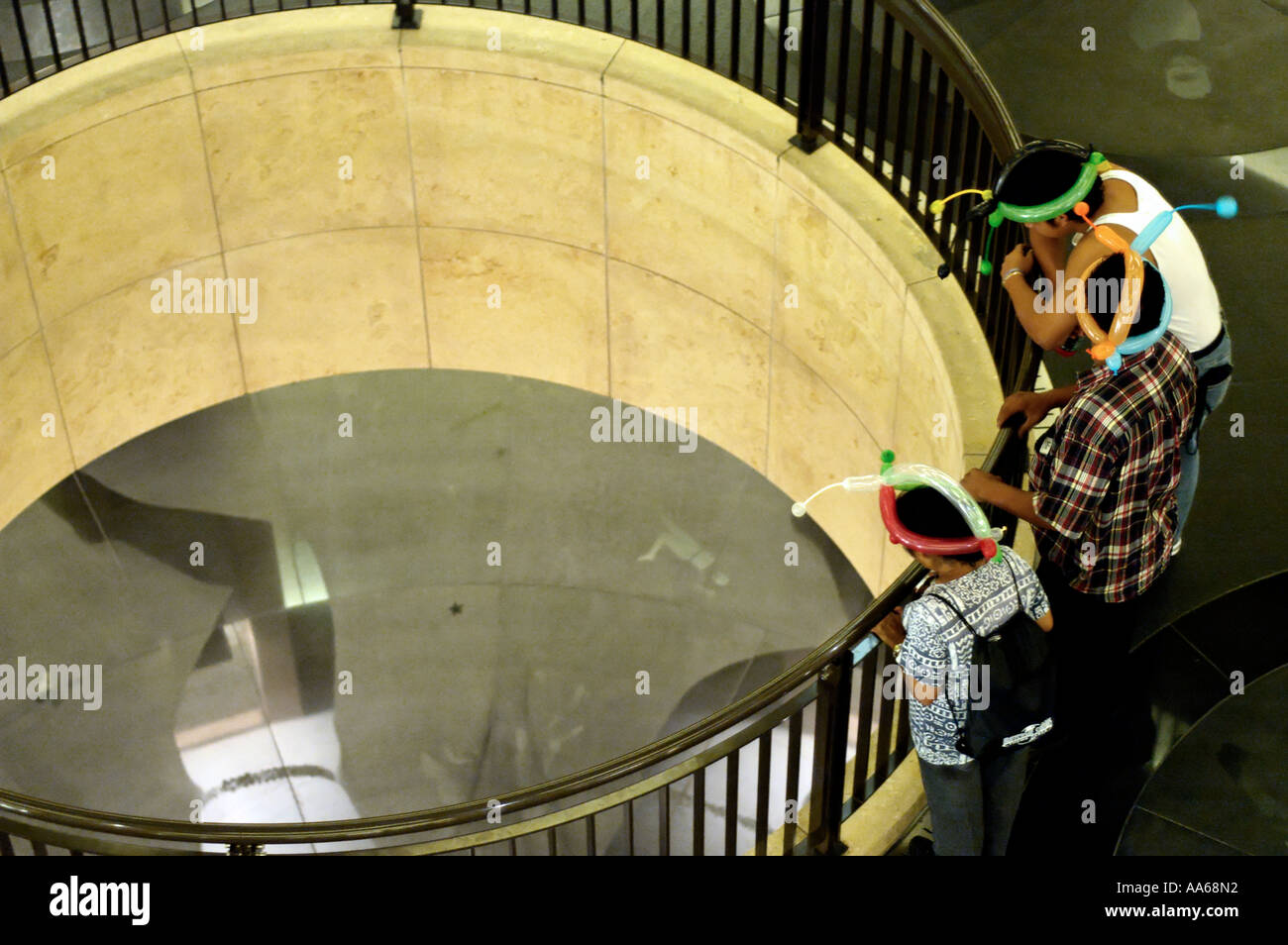 Overhead view of people standing at railing in the Hollywood Highland Center Hollywood California USA. Stock Photo