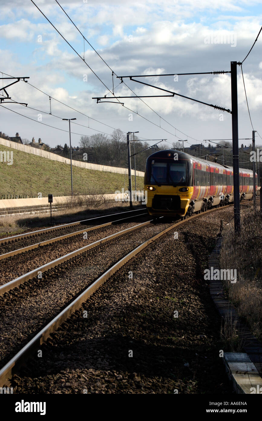 Commuter train approaching Crossflatts station Stock Photo Alamy