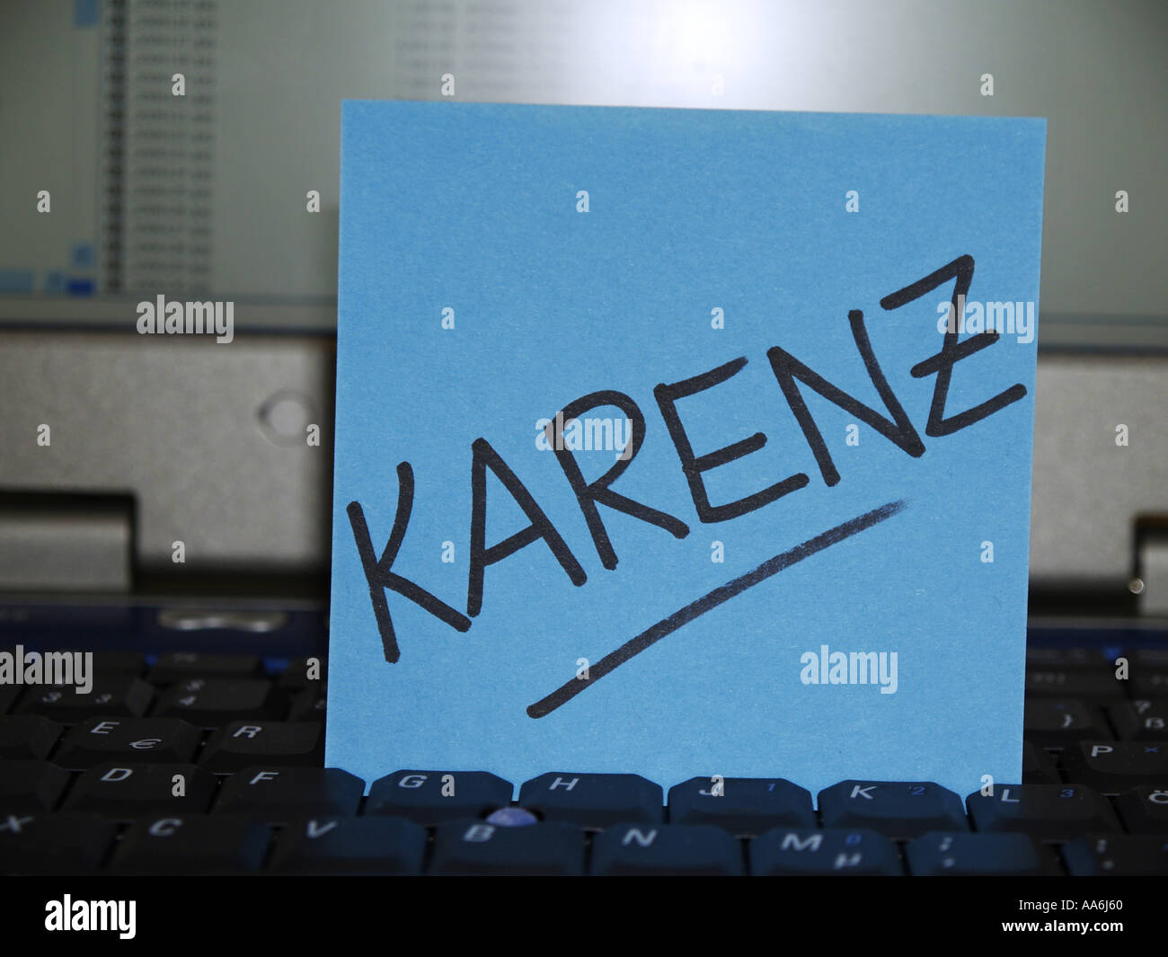 memo note on notebook, Karenz, maternity leave Stock Photo
