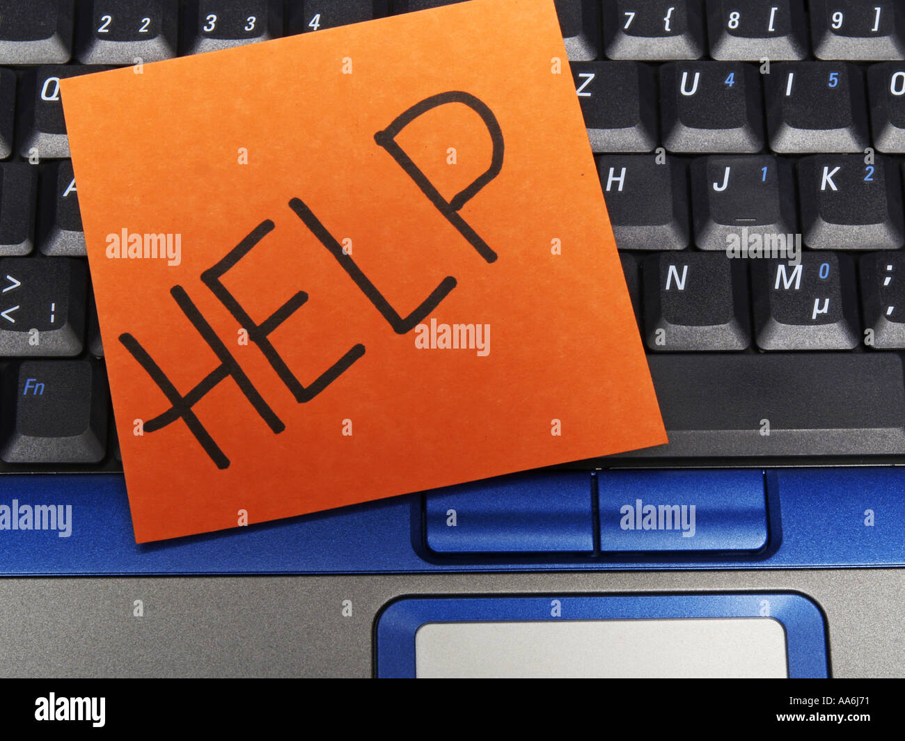 memo note on notebook, help Stock Photo - Alamy