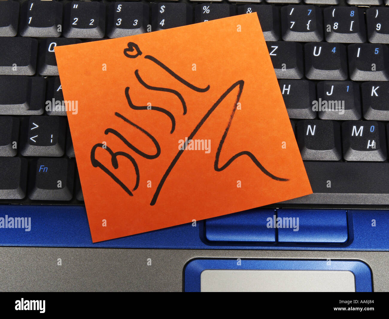 memo note on notebook, kiss Stock Photo Alamy
