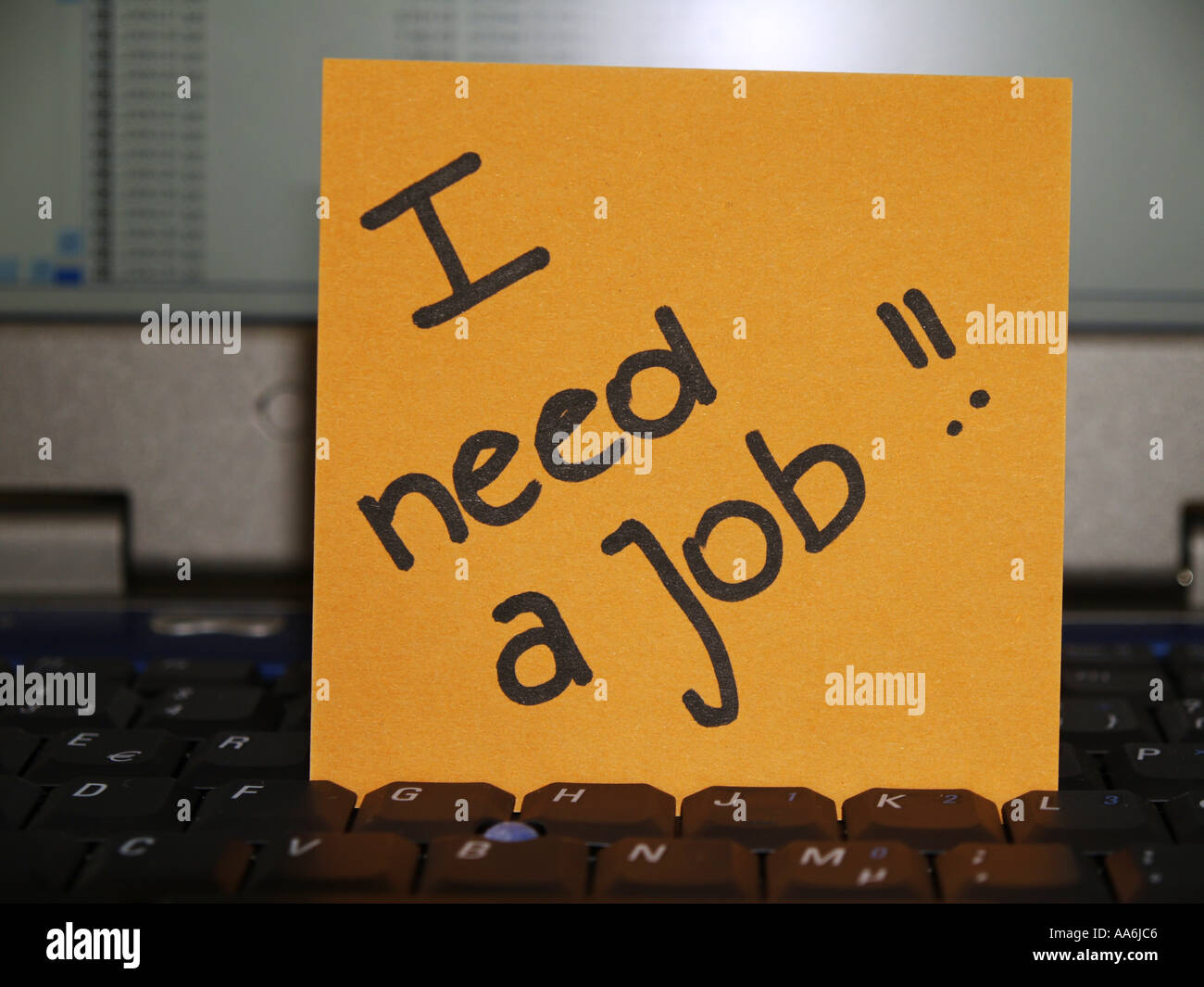 memo note on notebook I need a job Stock Photo
