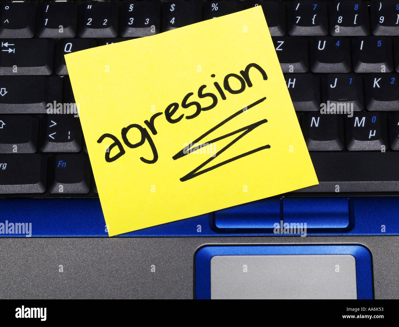 memo note on notebook, agression French aggression Stock Photo