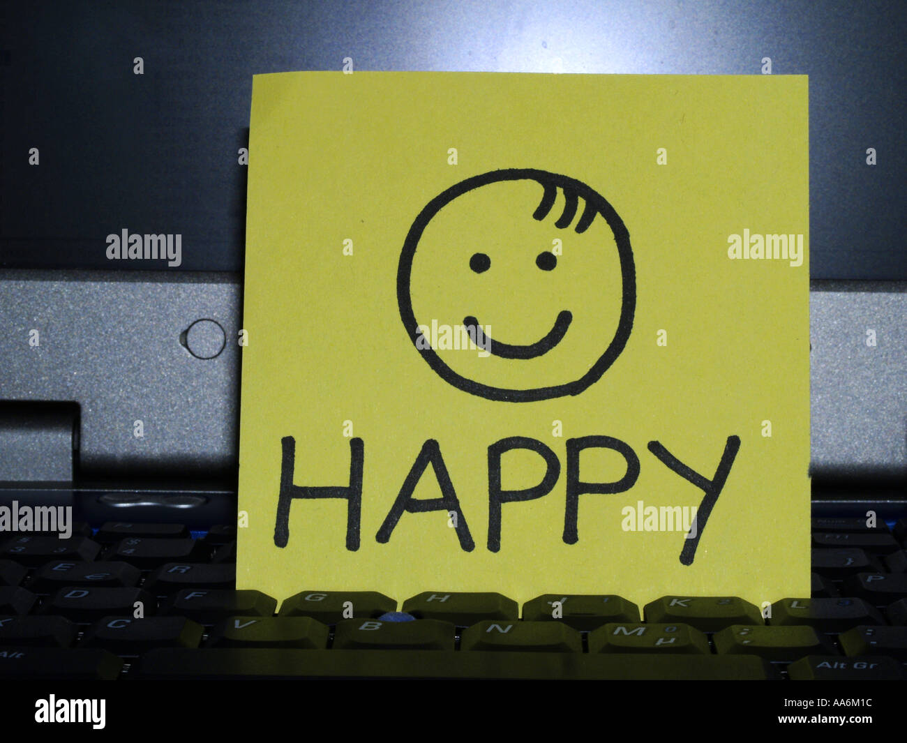 memo note on notebook, Happy drawing with smiley Stock Photo