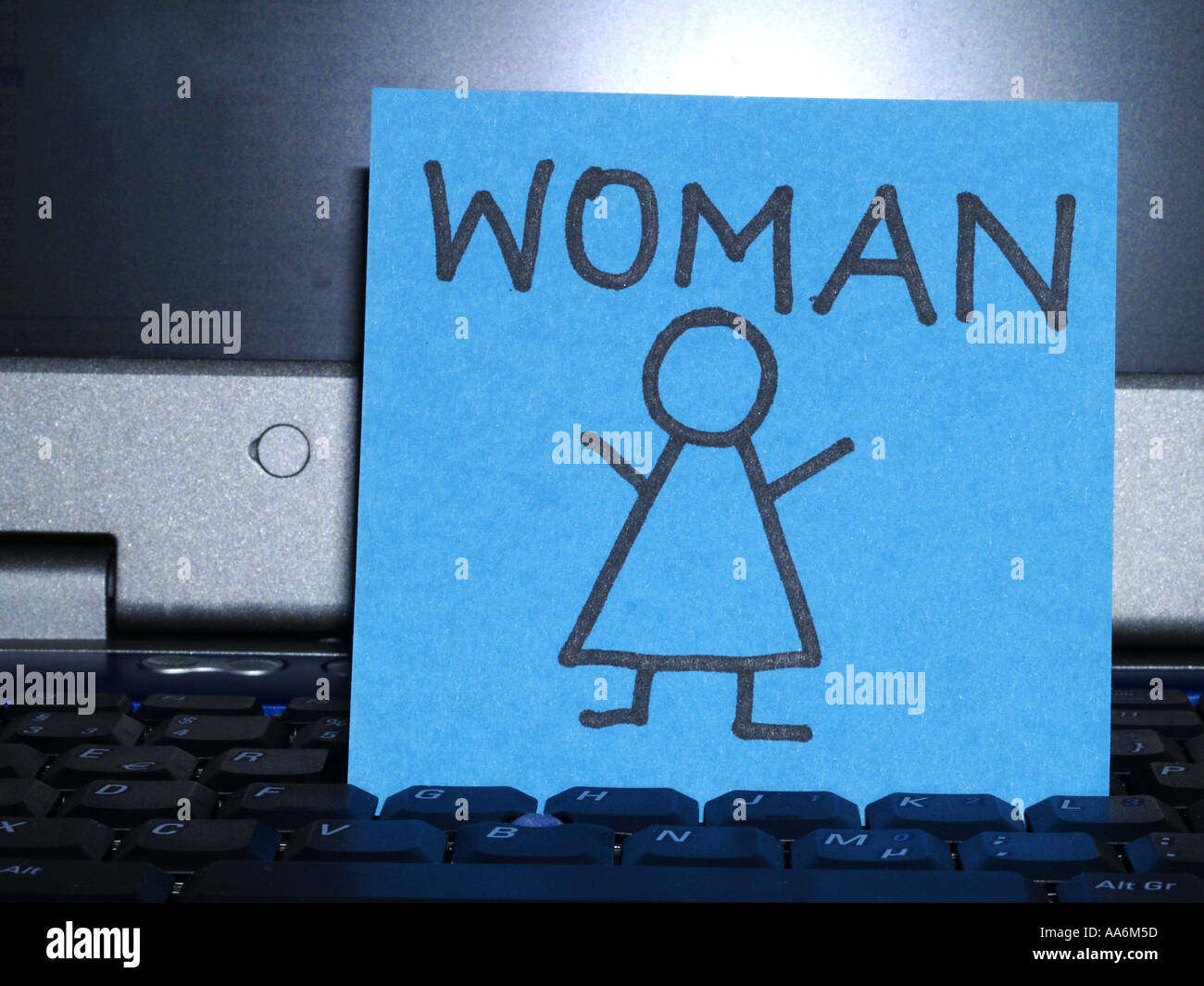 memo note on notebook drawing woman Stock Photo