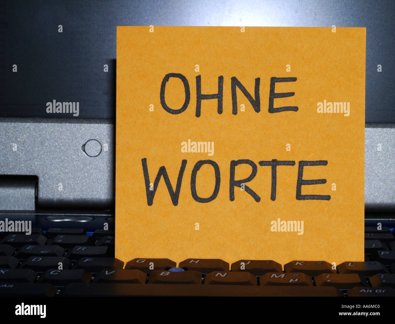 memo note on notebook, Ohne Worte, without words Stock Photo