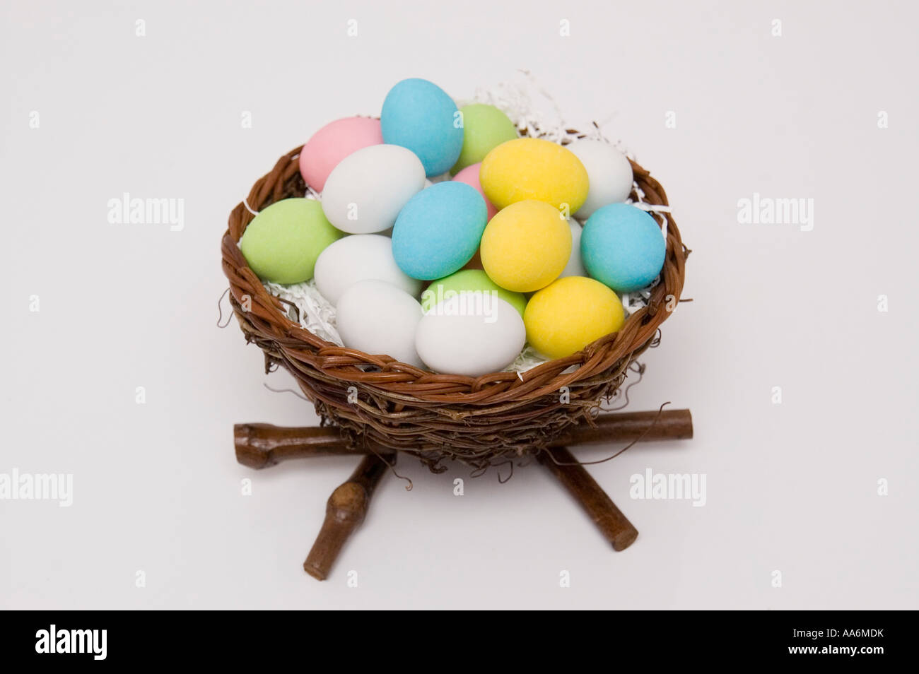 a bird on some Easter eggs in a nest Stock Photo - Alamy
