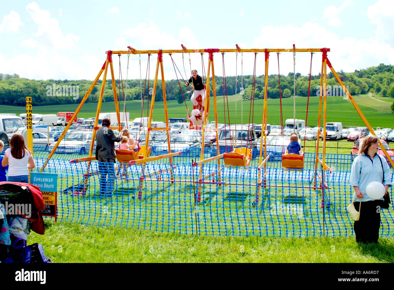 Children on swings Stock Photo