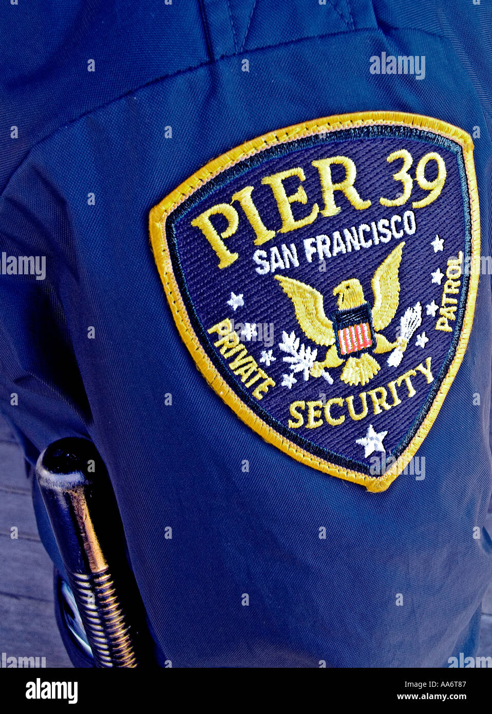 Security guard arm badge and night stick at Pier 39 Embarcadero San Francisco California USA Stock Photo