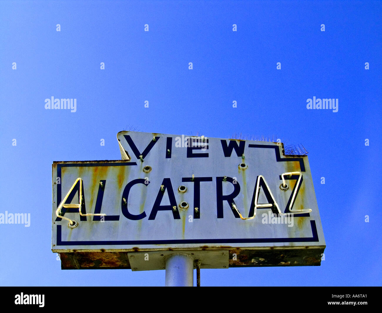 Weathered sign advertising boat trips to Alcatraz prison San Francisco California USA Stock Photo