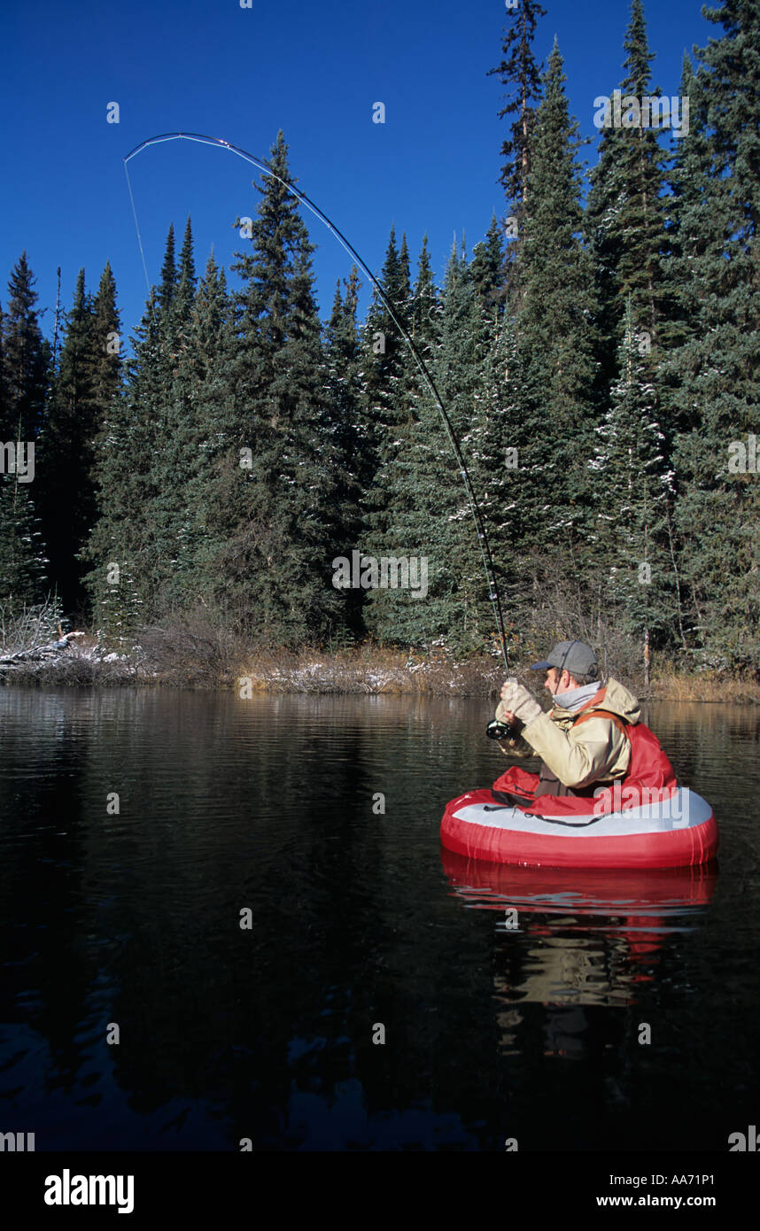 Flyfishing for trout from float tube Dennis lake BC Stock Photo - Alamy