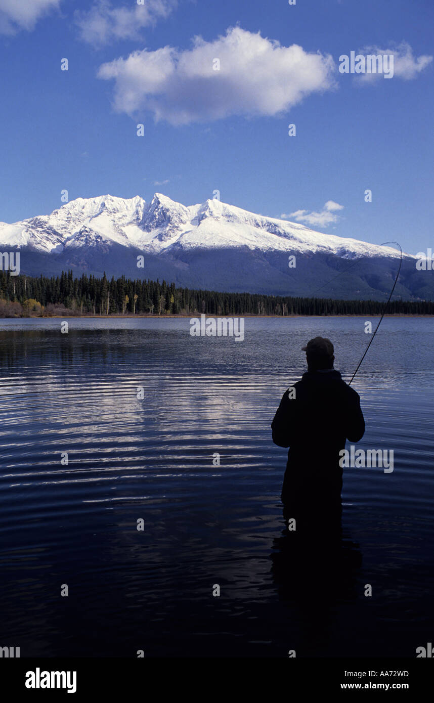 Flyfishing for trout Dennis Lake BC Stock Photo