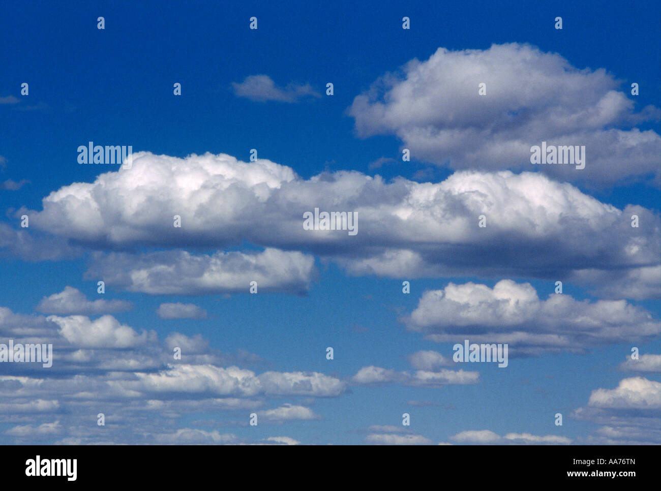 Stock Photo of Dramatic Clouds against a Deep Blue Sky Stock Photo - Alamy
