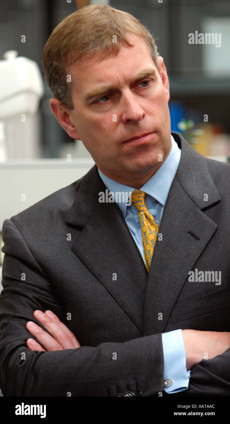 Prince Andrew HRH the Duke of York royal  visit serious folded arms listening Stock Photo