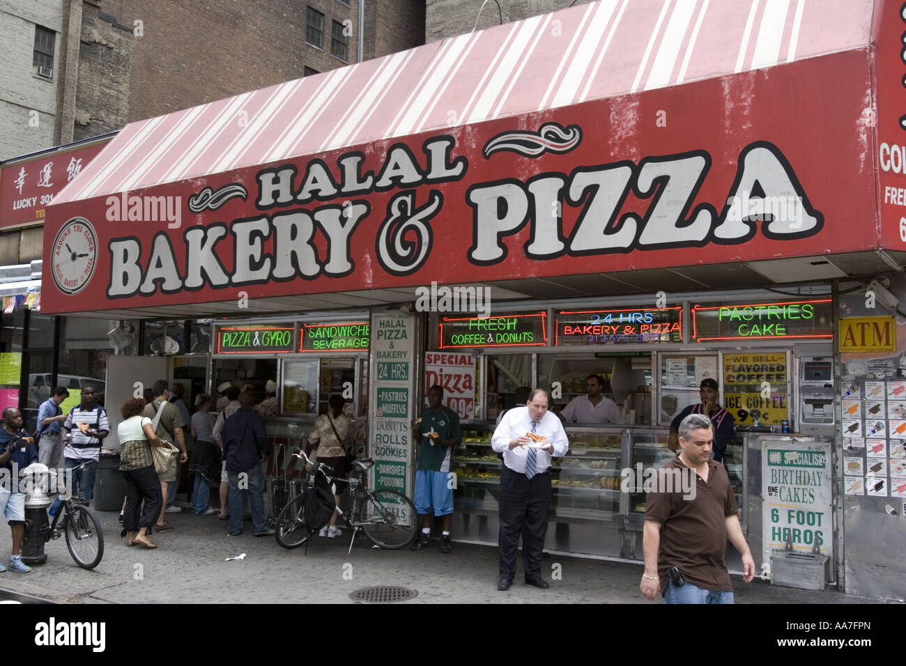 With the growing Muslim population more restaurants and food sellers now offer Halal meat New York City Stock Photo