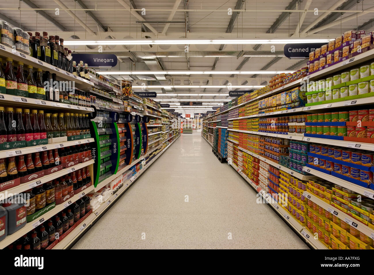 Stacked shelves at empty supermarket Stock Photo Alamy