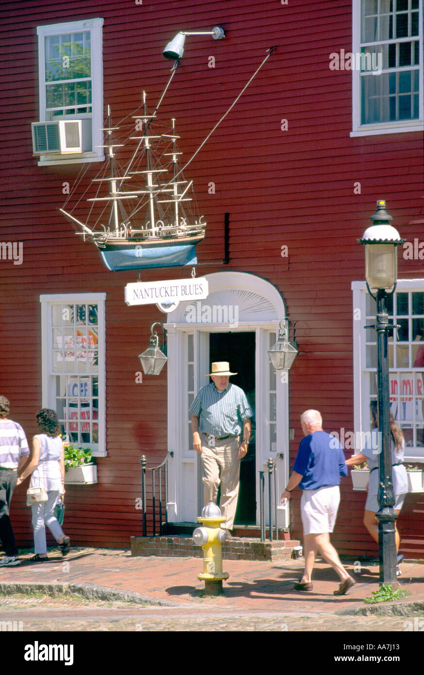 Nantucket town on Nantucket Island off Cape Cod, Massachusetts, USA. Shop boutique on Main Street with model whaling boat Stock Photo