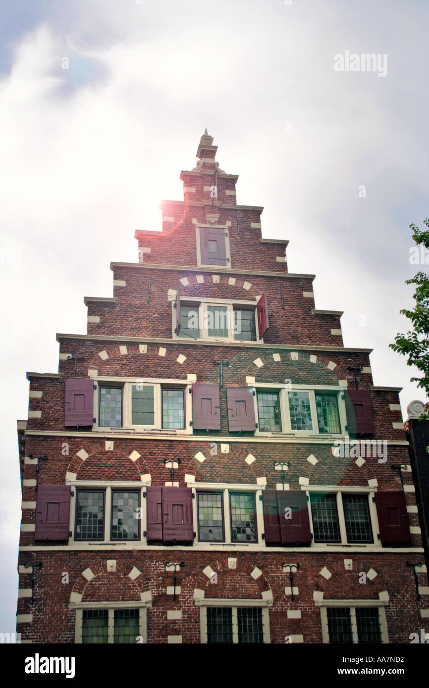 Historic C17th stepped gabled roof in the Dutch or Haarlem Renaissance style This house is called Het Wapen van Riga (contd..) Stock Photo