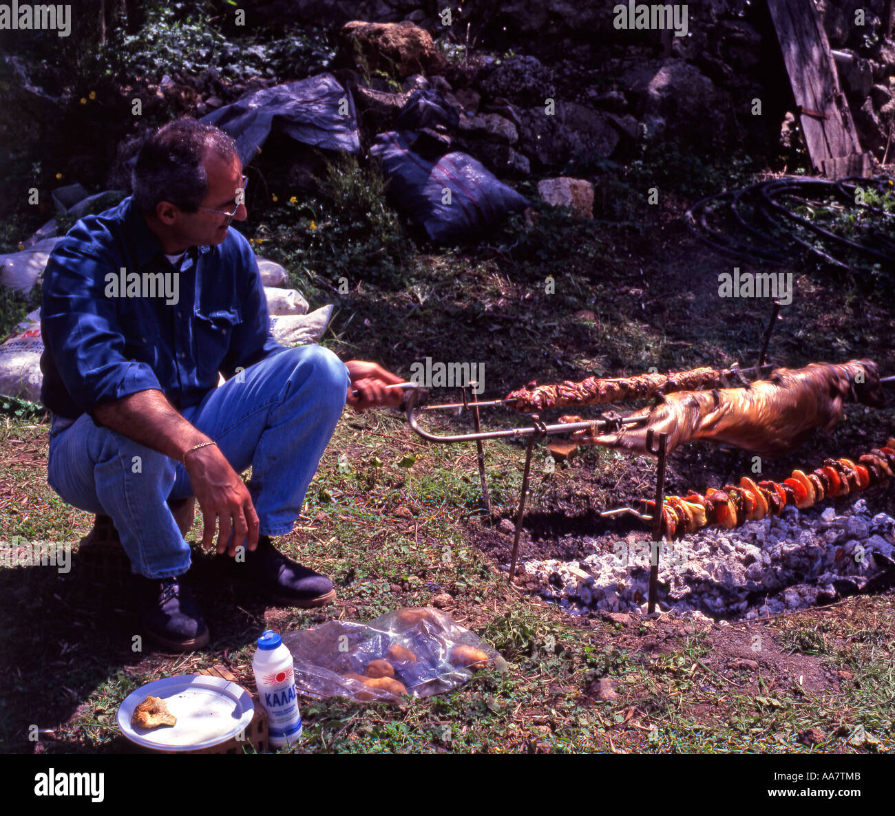 Greece Crete Whole lamb being roasted on a Spit on Easter Sunday Stock Photo