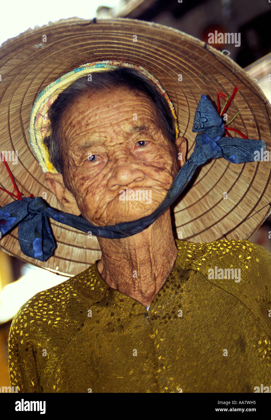 Toothless elderly woman posing for camera, Hoi An, Vietnam Stock Photo