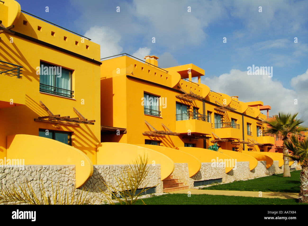 Portimao marina complex bright coloured villas and apartments Portimao  Algarve Portugal EU Europe Stock Photo - Alamy