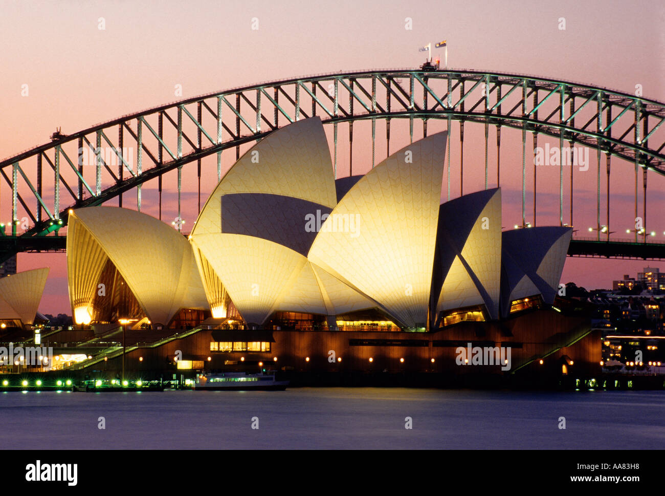 Sydney Opera House and Harbour Bridge at dusk Stock Photo - Alamy