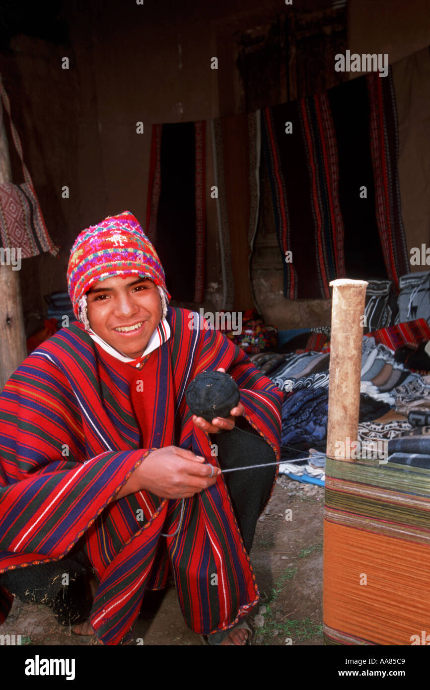 Young Quecha Man Skeining Wool Chinchero Peru Stock Photo