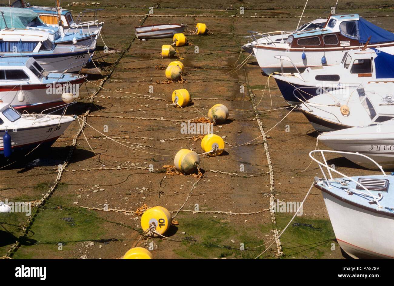 Boats and mooring buoys at low tide Old Harbour St Helier Jersey Channel  Islands UK Stock Photo - Alamy