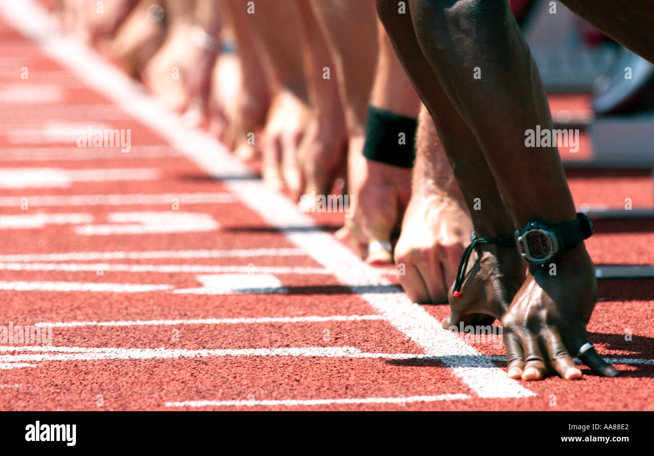 Hands of sprinters awaiting the start Stock Photo Alamy
