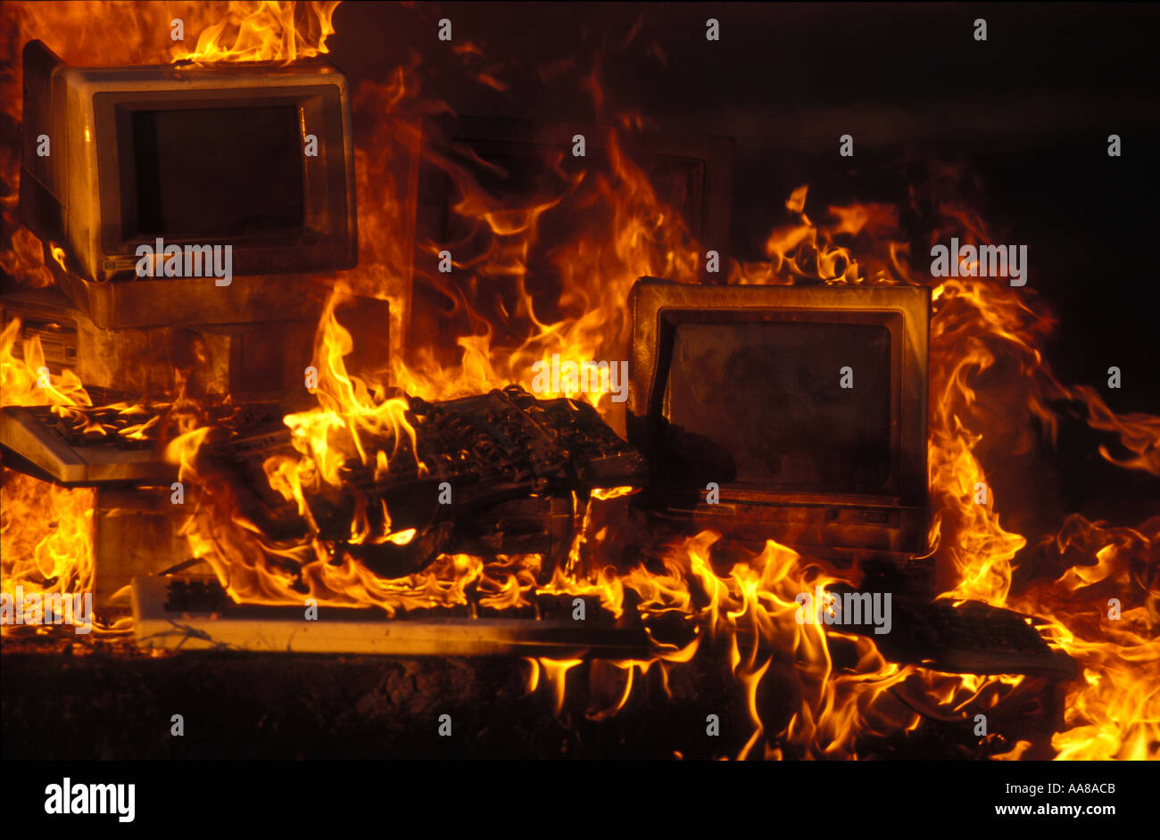 Burning computers hi-res stock photography and images - Alamy