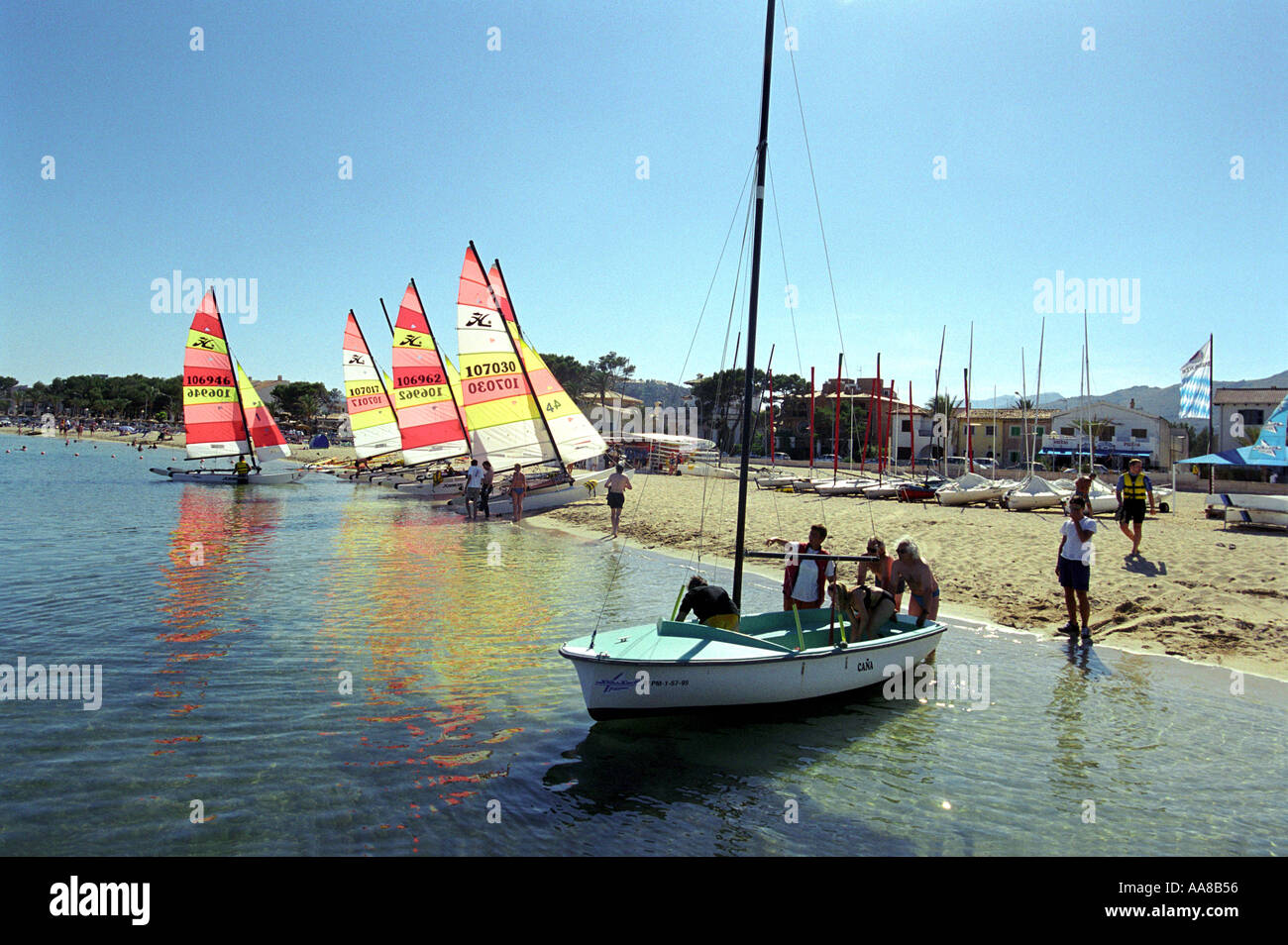 Sailing boats on the beach at Puerto Pollensa in Majorca Stock Photo