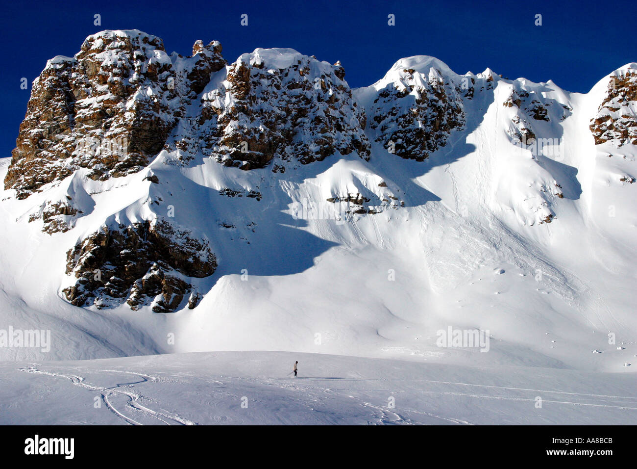 Single skier crossing through the untracked powder Grimentz Switzerland Stock Photo