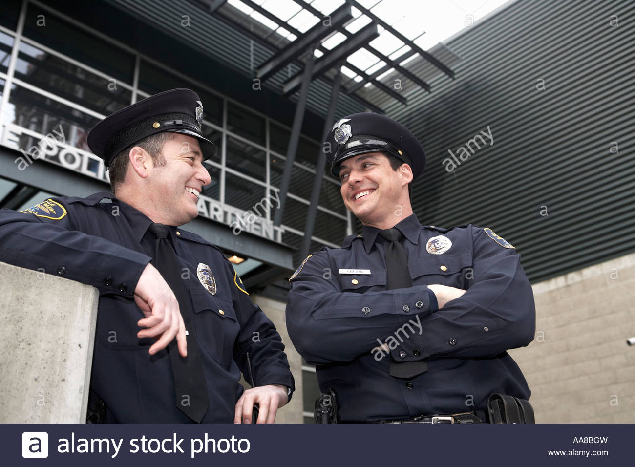 Male police officers talking outside Police Department Stock Photo 12547896 Alamy