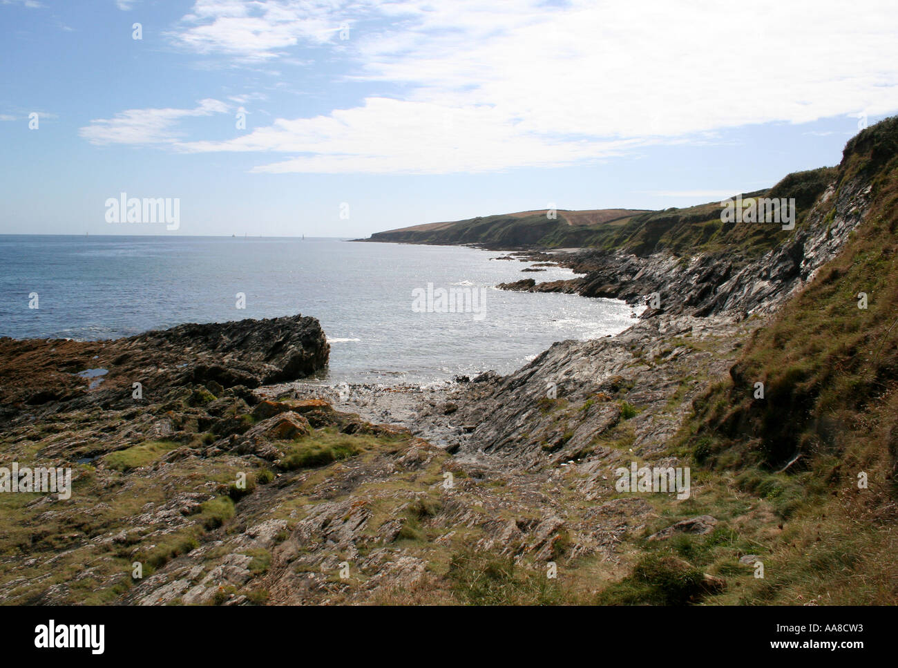 Coast and sea view from the rocks at Portscatho, Cornwall, England Stock Photo