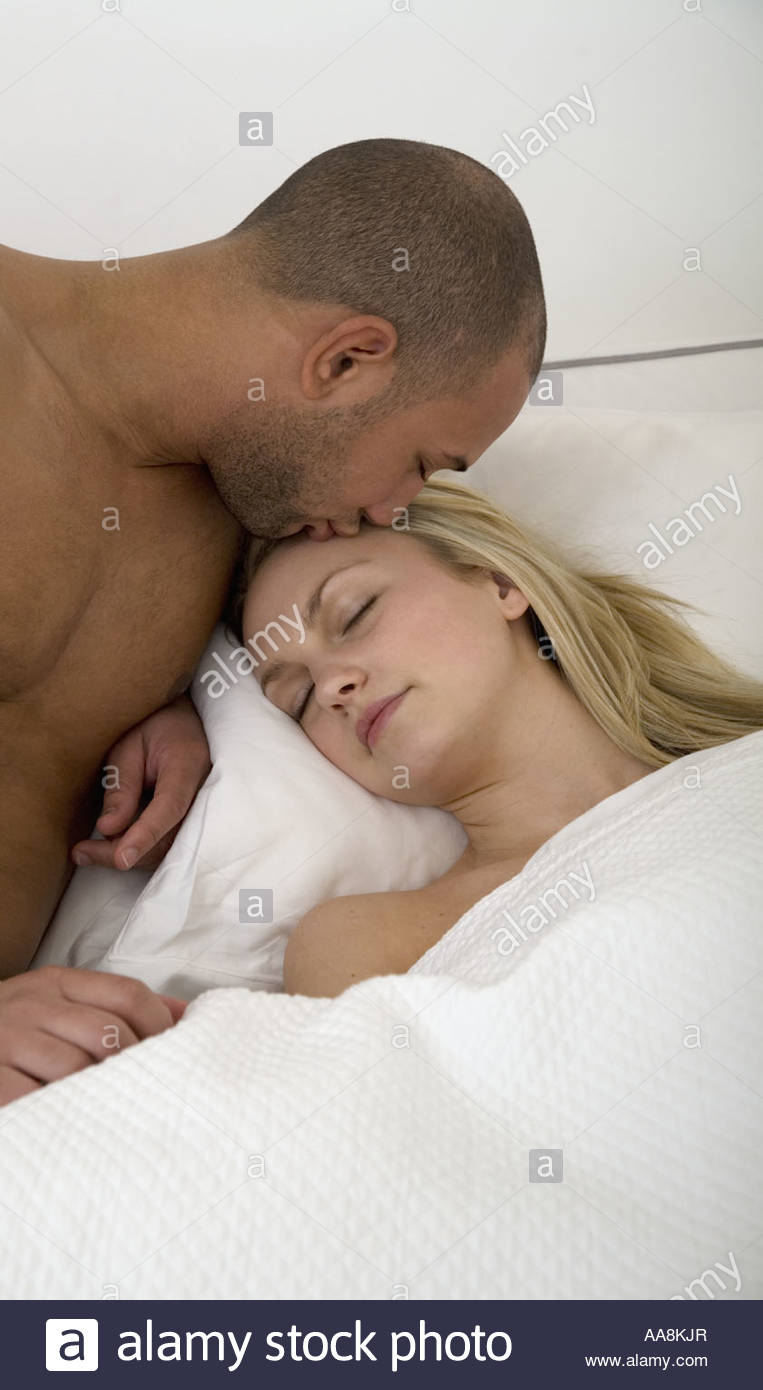 Hispanic Couple Kissing In Bedroom Stock Photos Hispanic