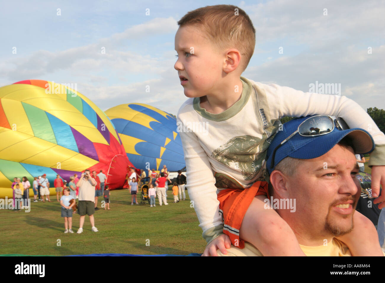 Alabama Morgan County,Decatur,Alabama Jubilee Hot Air Balloon Classic,flight,father dad,parent parents,son on shoulders,visitors travel traveling tour Stock Photo
