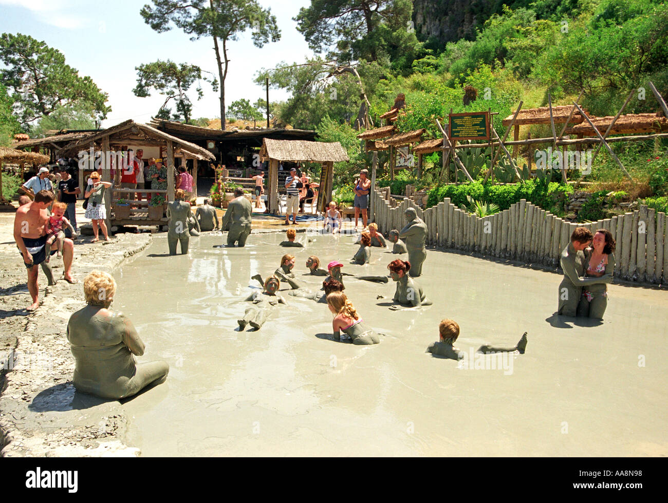 Tourists enjoy the Mud Baths at Dalyan in Turkey Stock Photo