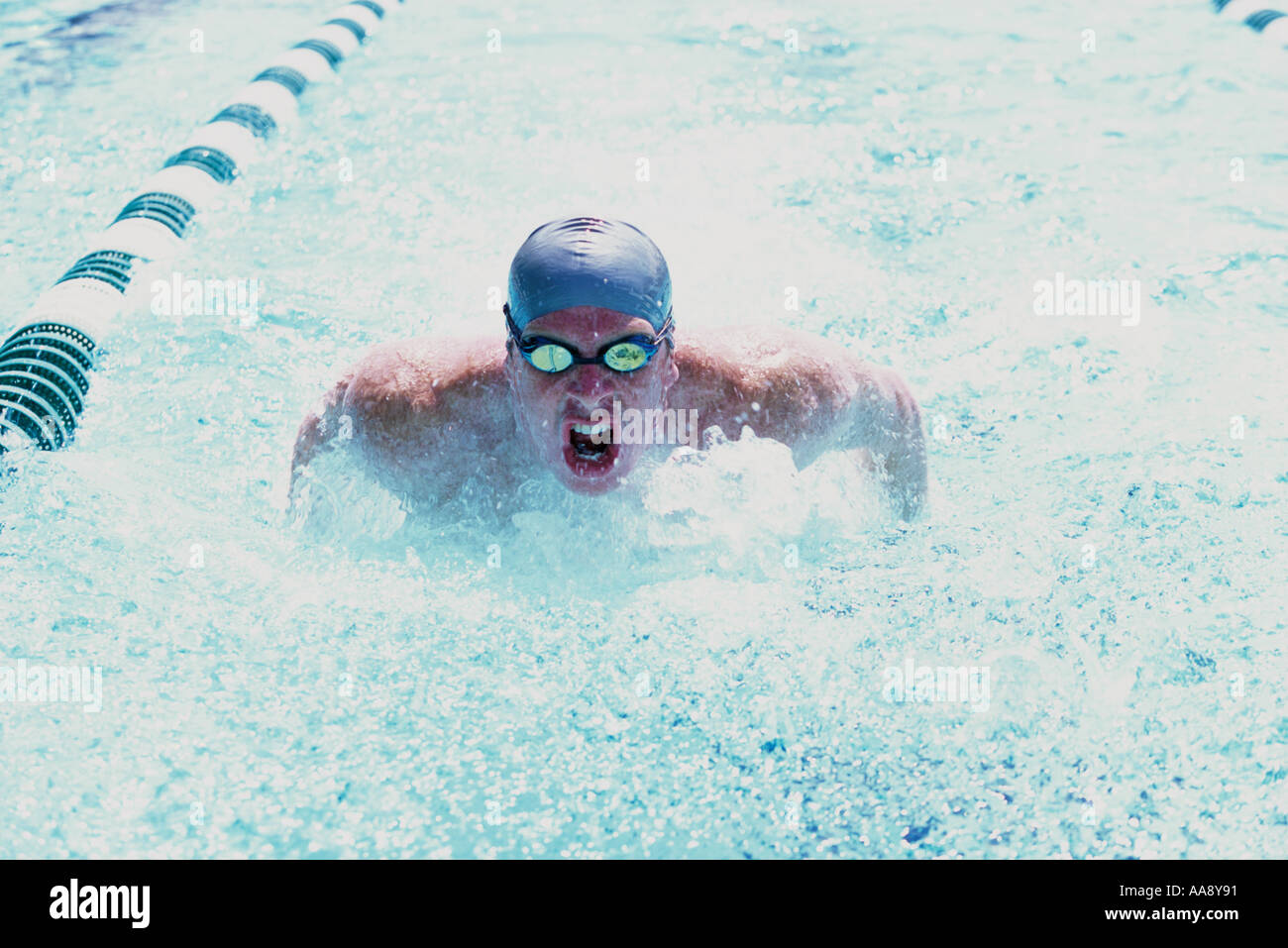Action man in swimming pool hi-res stock photography and images - Alamy