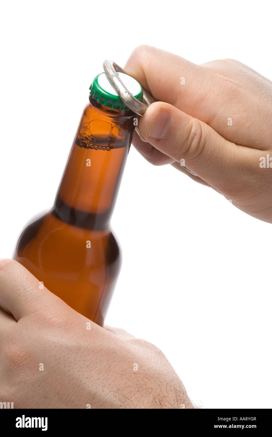 Person opening a bottle of beer Stock Photo