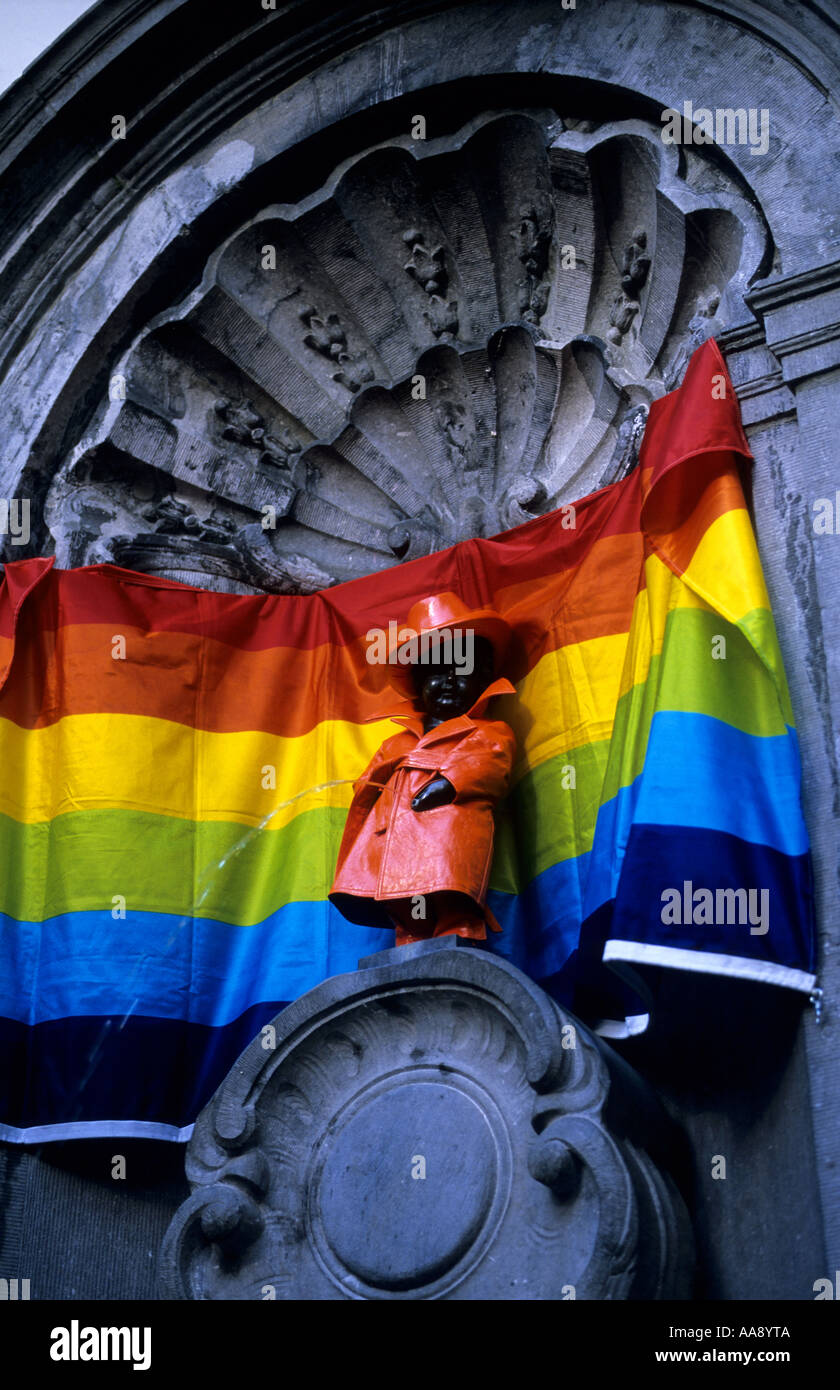 Manneken Pis statue is dress up with rainbow coloured flag Gay Pride Parade in Brussels Flanders Belgium Stock Photo