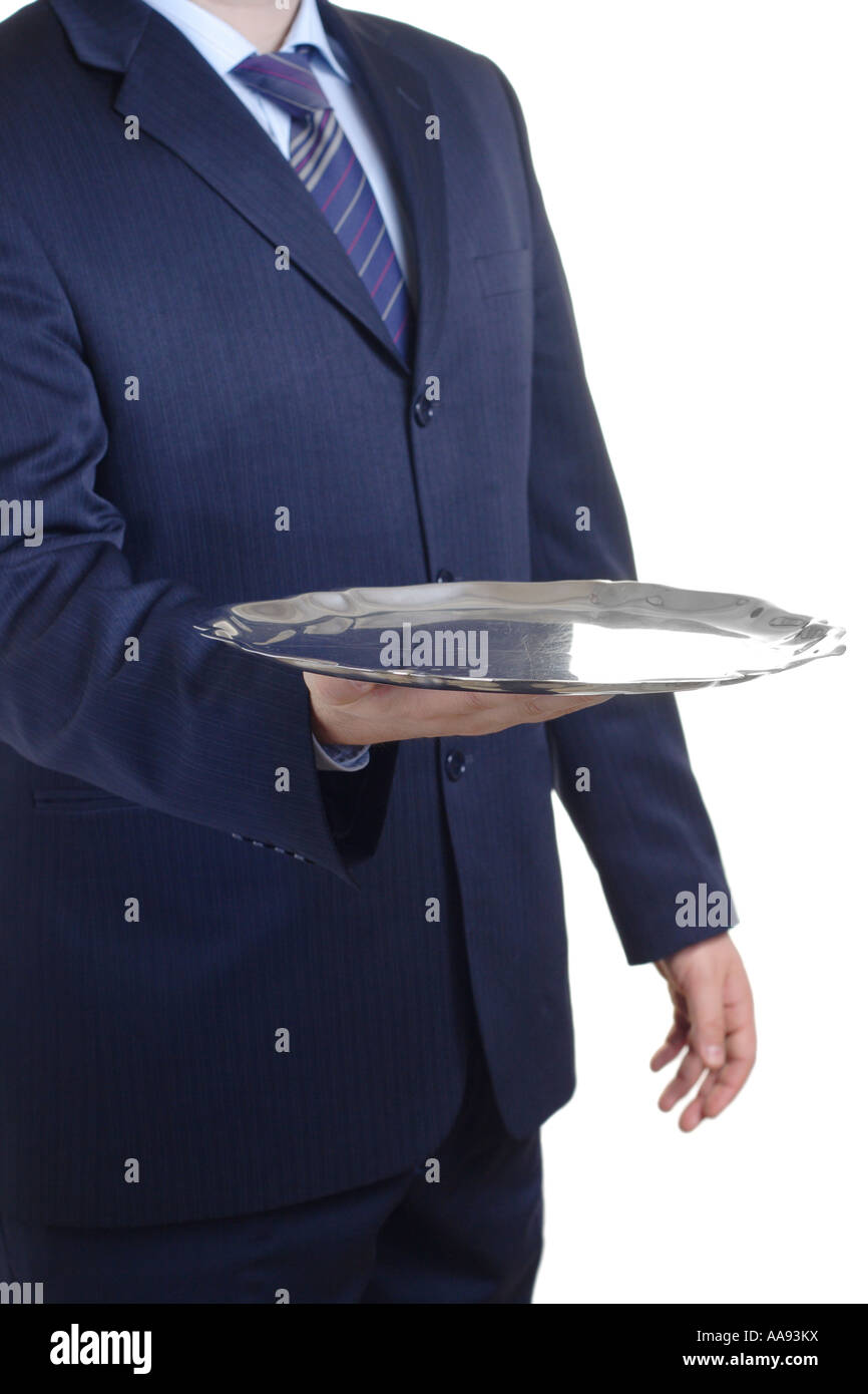 Butler carrying silver serving tray hi-res stock photography and images ...