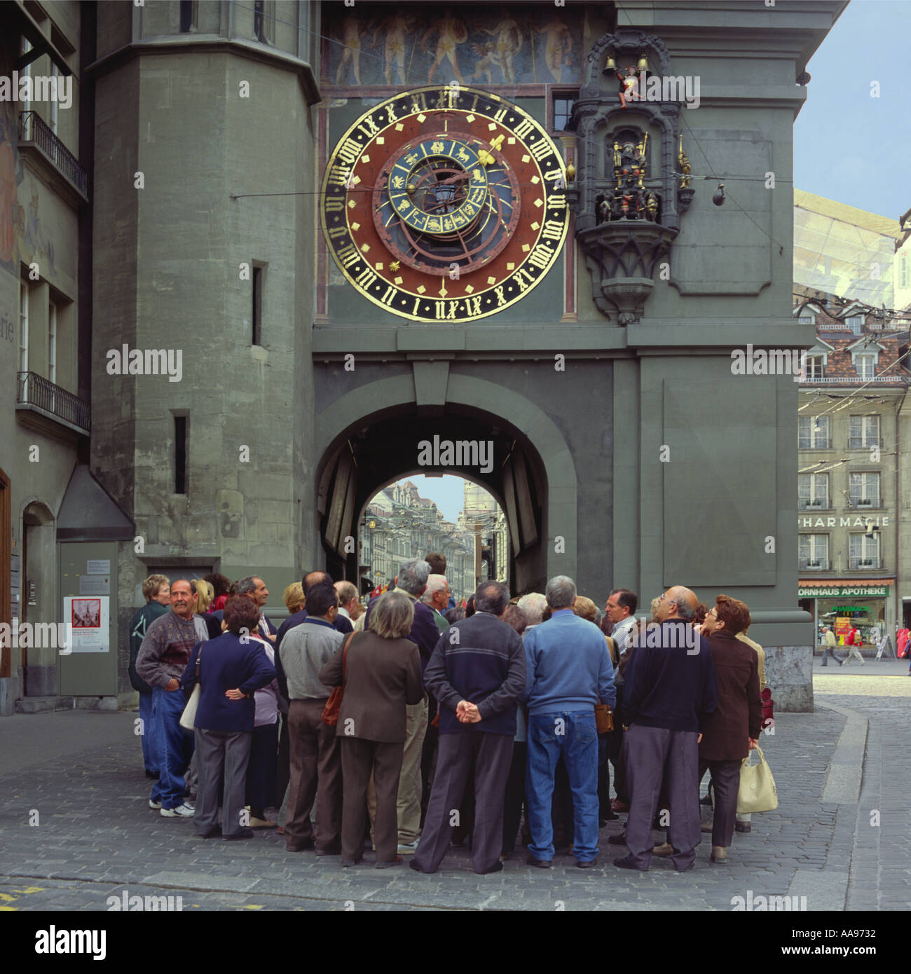 Large gathering of visitors in Krangasse a main street at base of the Zytgloggenturm clock tower Bern city Switzerland Stock Photo