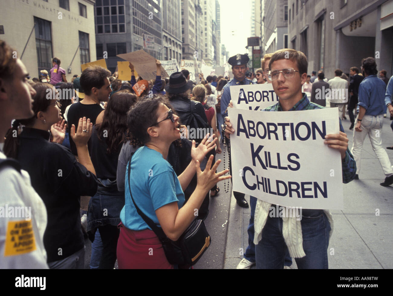 A kind of stand off between pro choice and pro life advocates on 5th Avenue in New York City Stock Photo