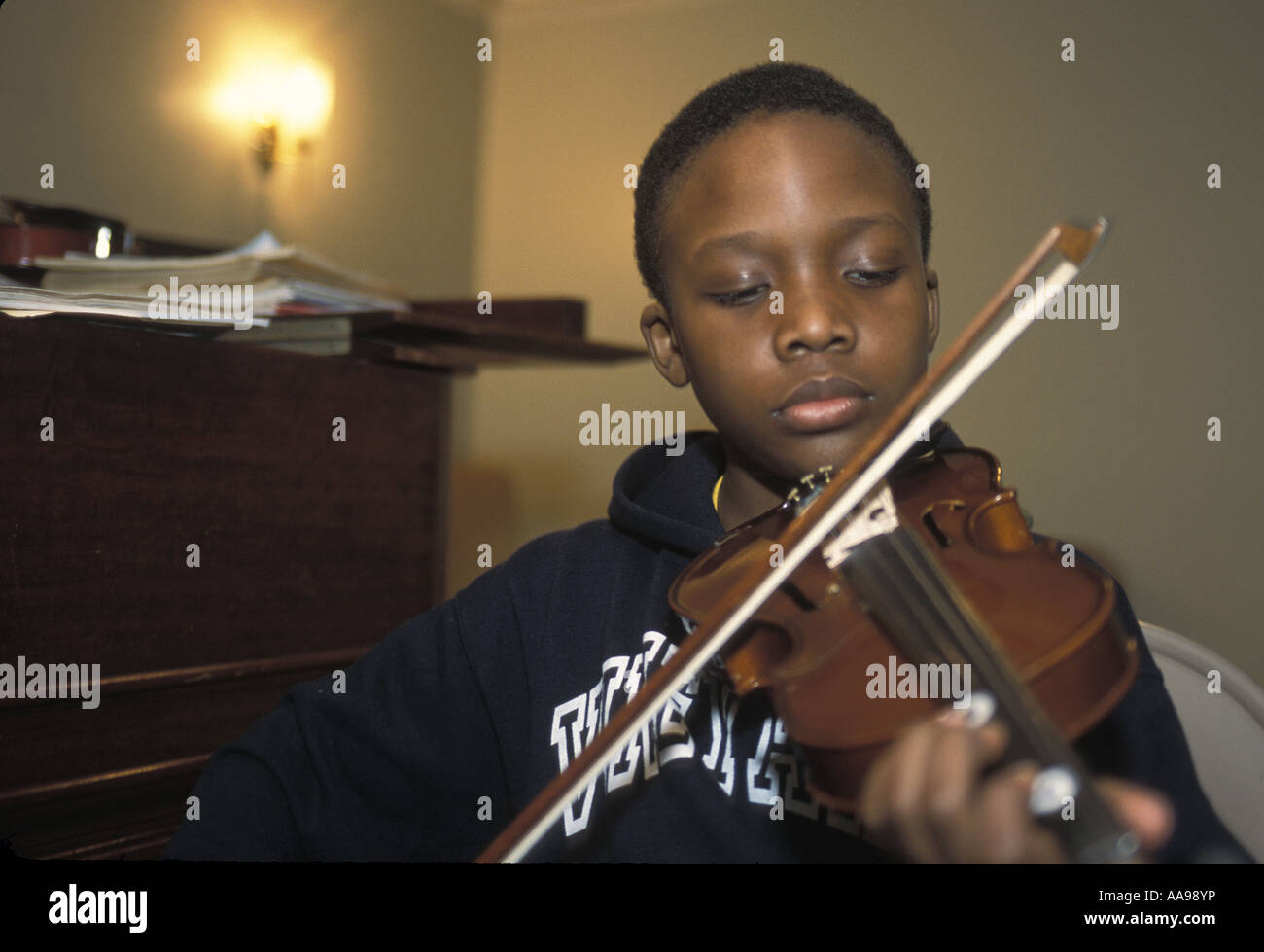 Young boy at a violin lesson at the Brooklyn Music School in Brooklyn