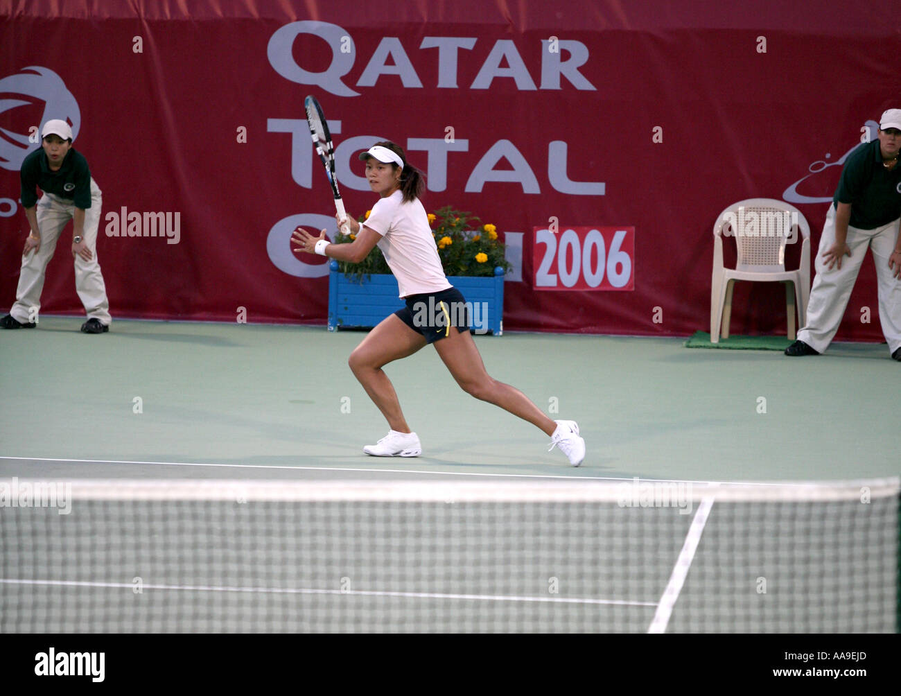 Chinese tennis star Li Na in action in Doha Qatar March 2006 against Daniella Hantuchova Stock Photo