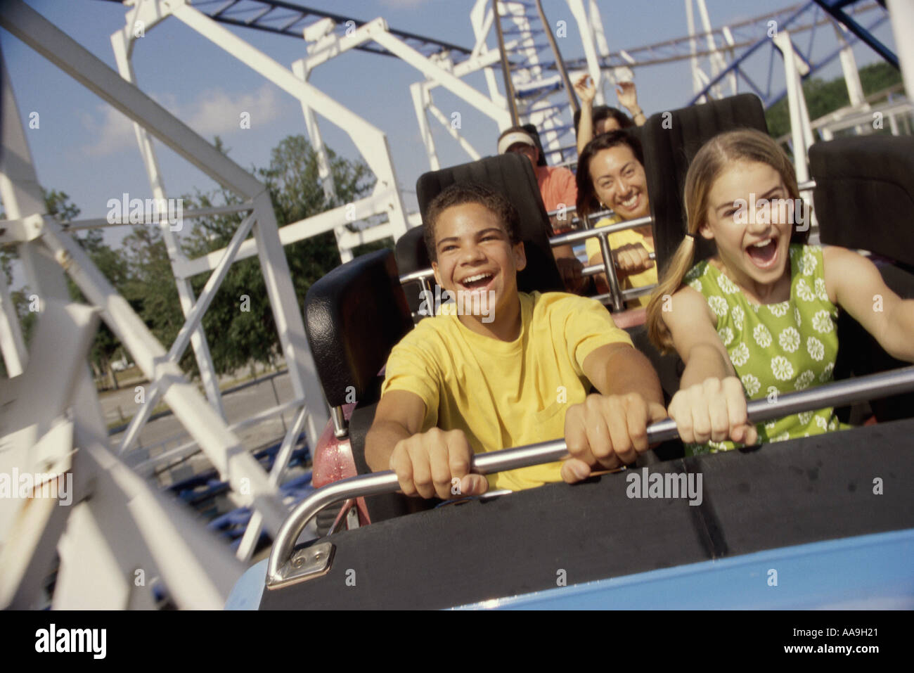 Teenage Couple On A Roller Coaster Ride Stock Photo 4099