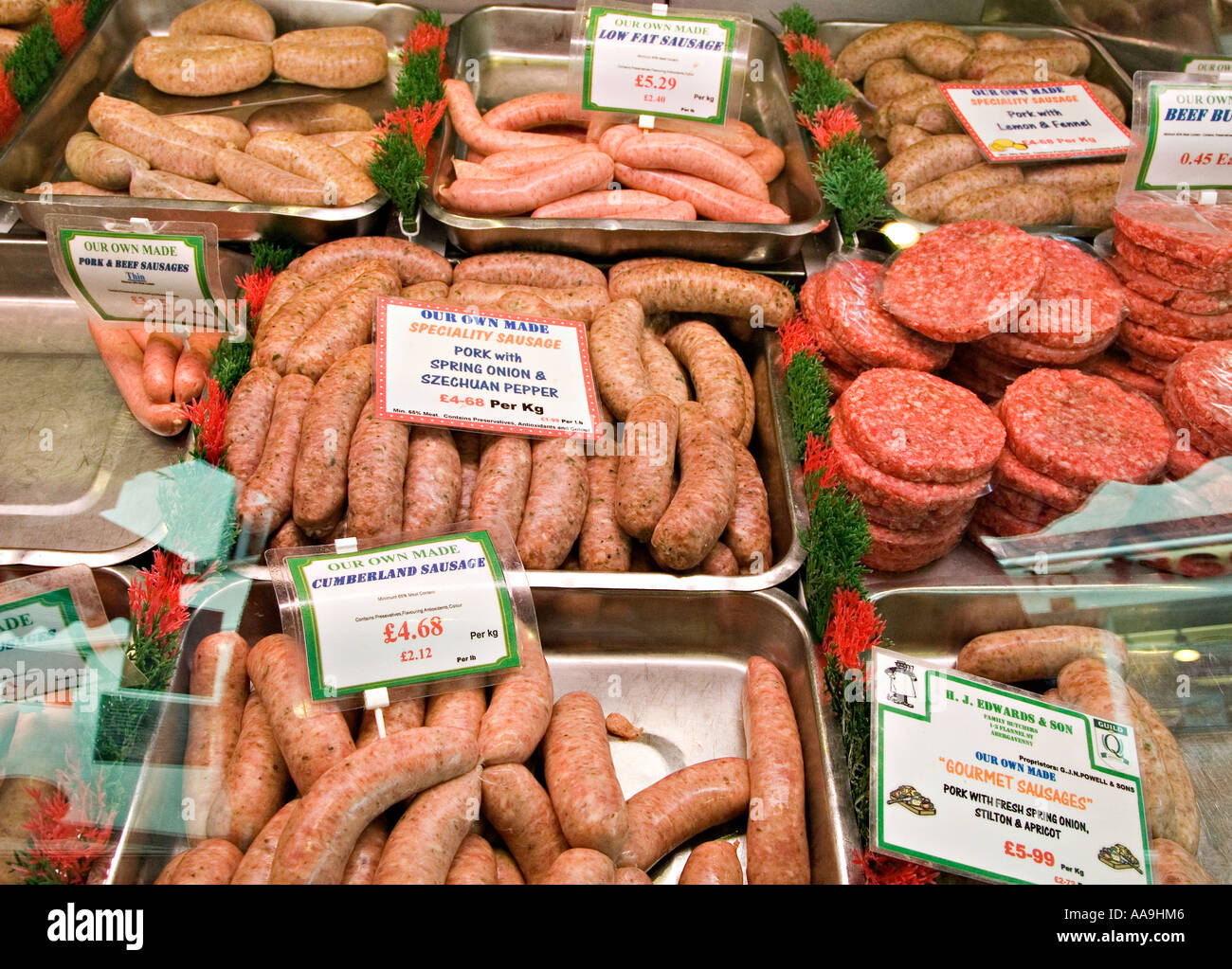 Butcher's display of home made sausages and beefburgers for sale in